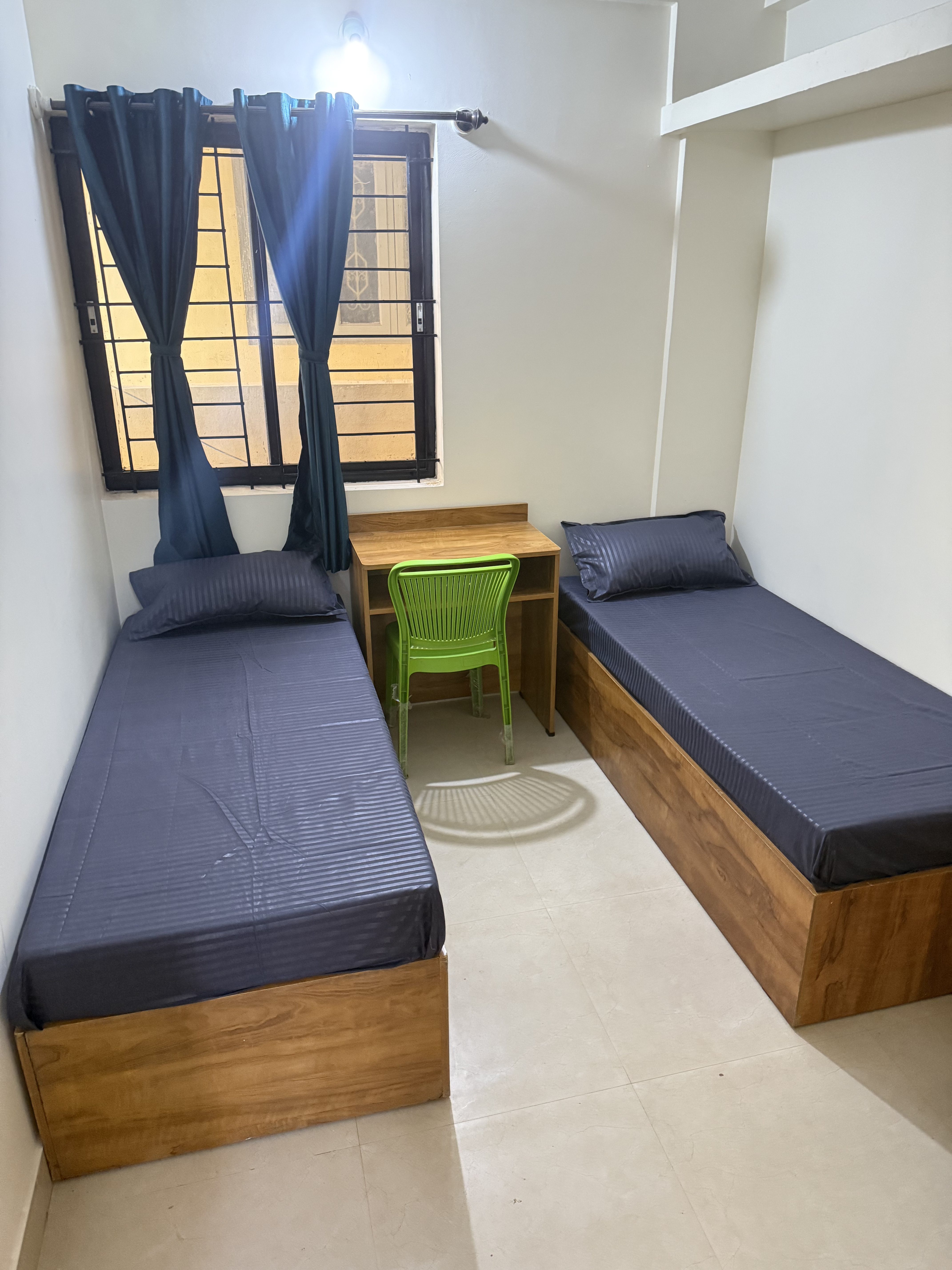 Furnished girls PG room at Cream House near Christ University